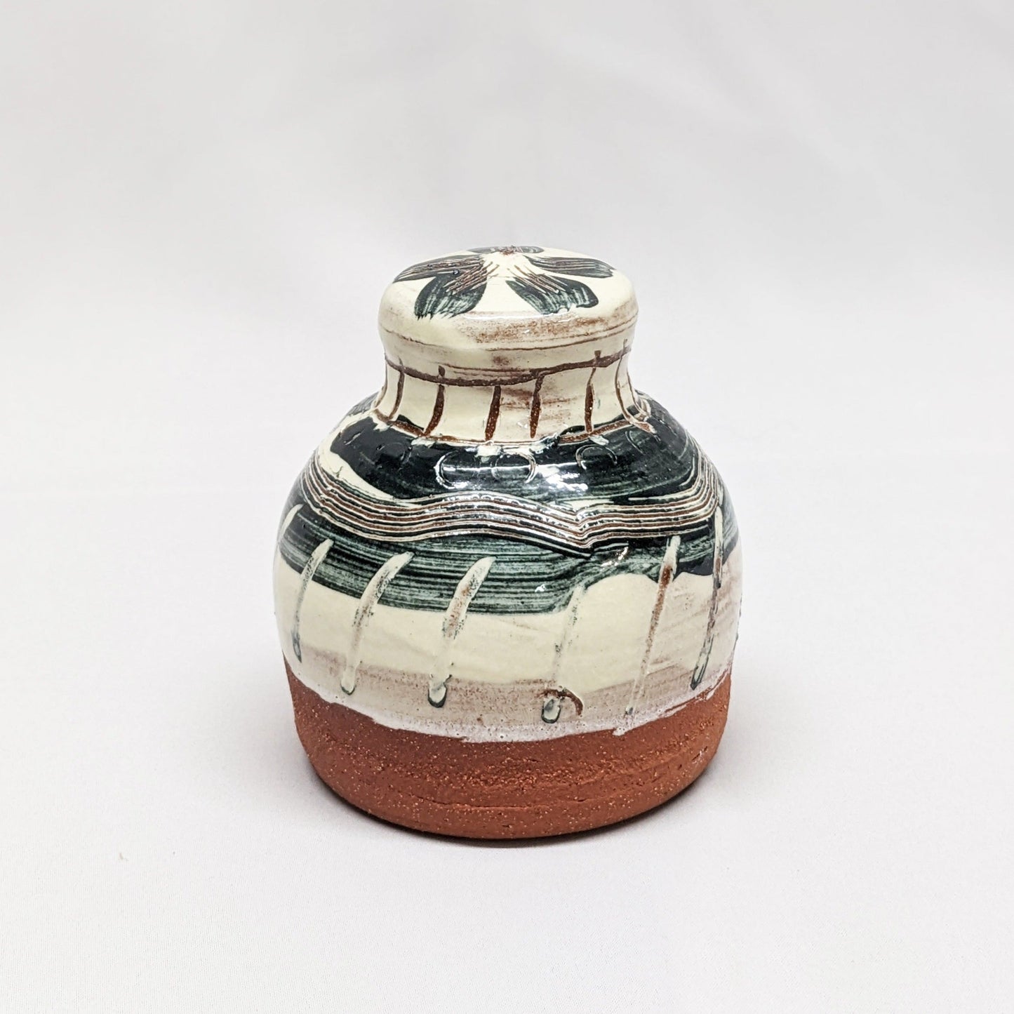 Terracotta watering roses by Camille Biddell