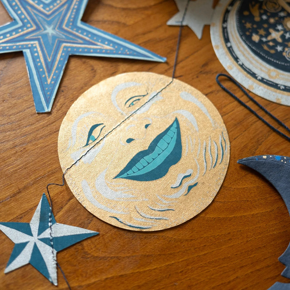 Man on the Moon Garland by East End Press