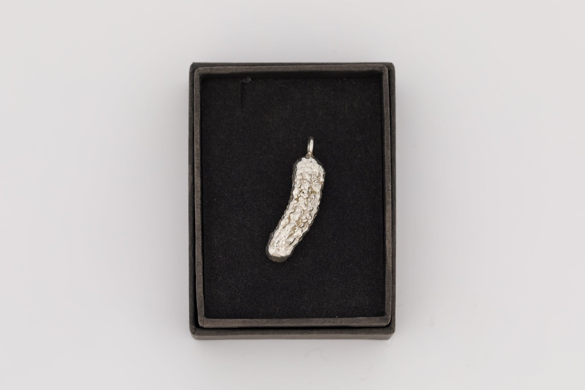 'Cornichons' solid silver pickle pendants by Caitlin Hazell