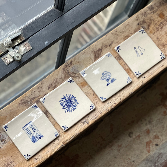 Blue and White Ceramic Tiles by Laura Winstone